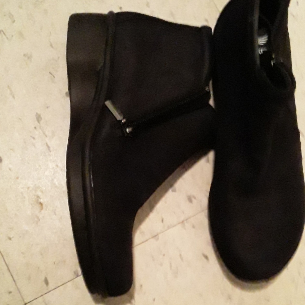 A pair of new Dansko  size 9  black ankle boots.
